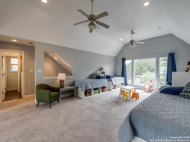 bedroom with light carpet, multiple windows, and lofted ceiling