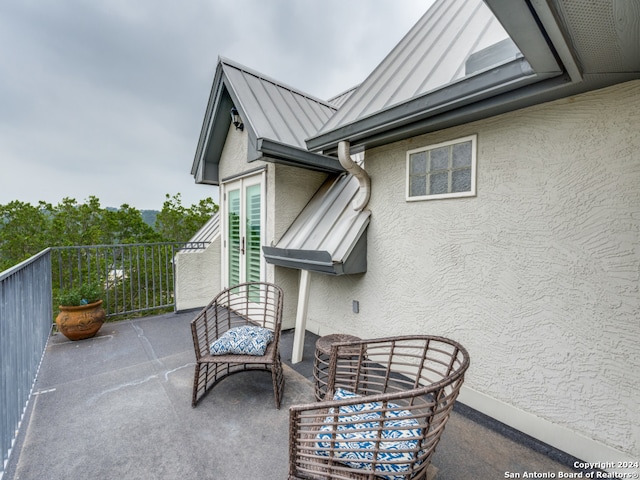 view of patio / terrace featuring a balcony