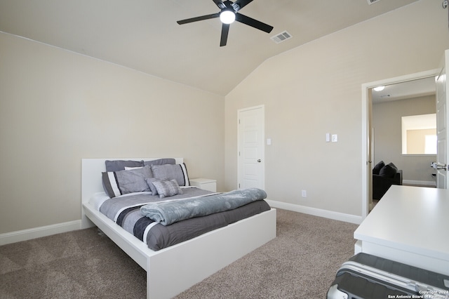 bedroom with carpet flooring, ceiling fan, and vaulted ceiling