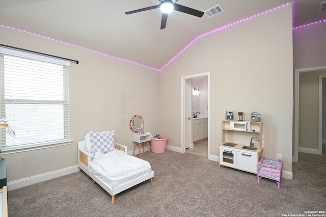 sitting room featuring ceiling fan, lofted ceiling, and carpet floors