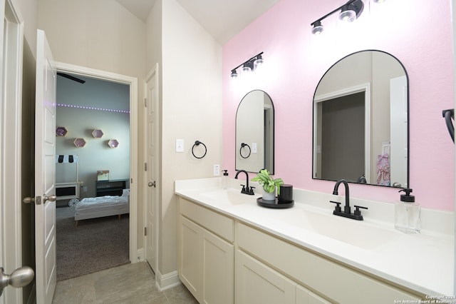 bathroom featuring tile patterned floors and vanity