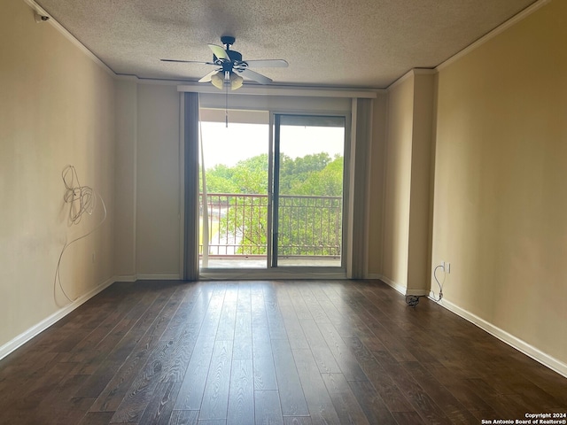 unfurnished room with dark hardwood / wood-style flooring, plenty of natural light, and crown molding