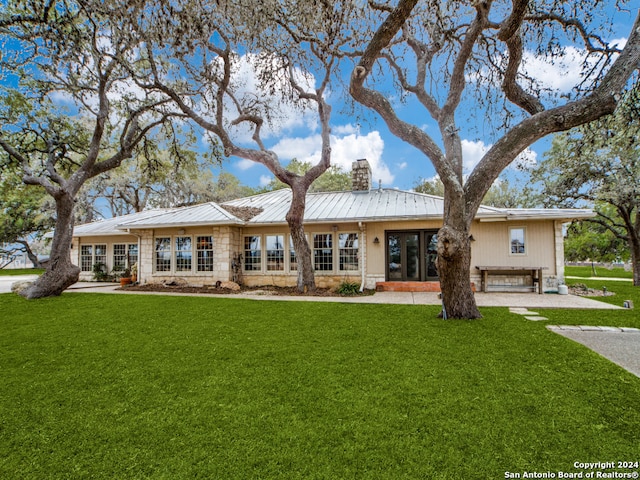 view of front of home with a front lawn