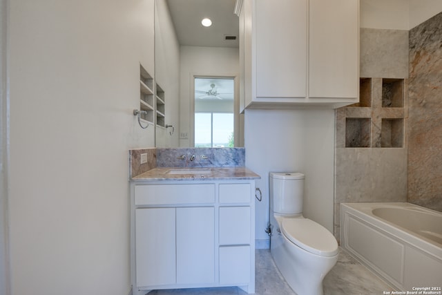 bathroom with tile floors, ceiling fan, oversized vanity, and toilet