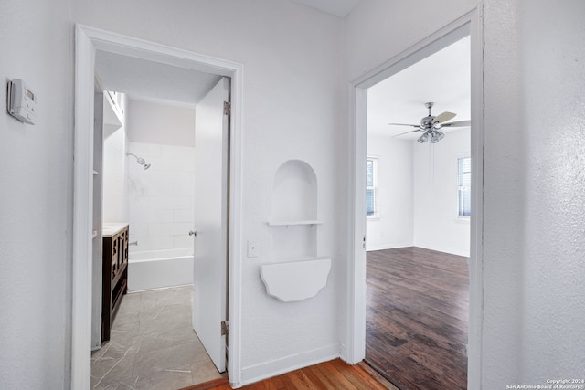 corridor featuring tile flooring