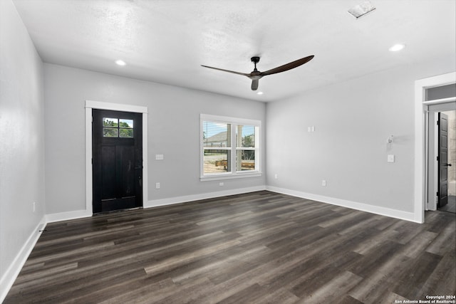 entrance foyer featuring dark hardwood / wood-style flooring and ceiling fan