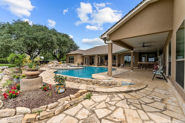 view of pool featuring a patio area and ceiling fan