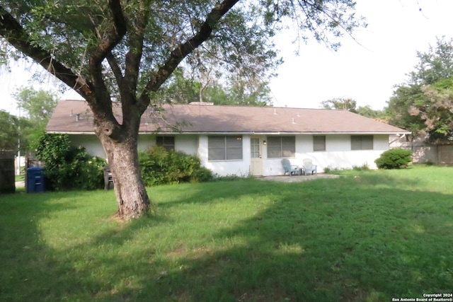 exterior space with a front yard