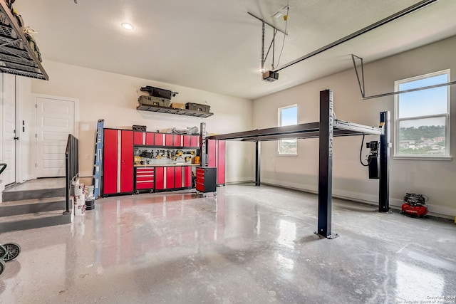 garage featuring a garage door opener