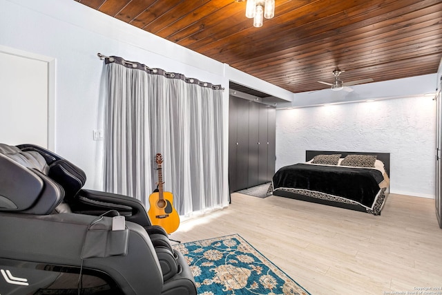 bedroom featuring hardwood / wood-style flooring and wooden ceiling