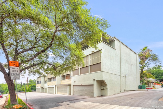 view of building exterior with a garage