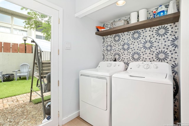 clothes washing area featuring washing machine and dryer