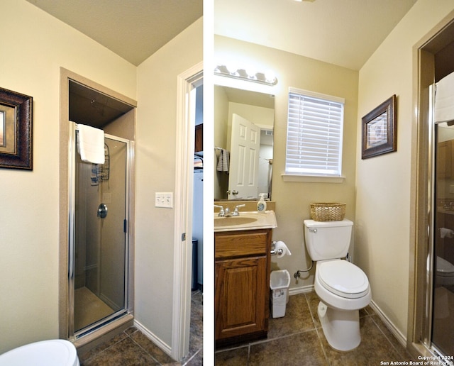 bathroom with a shower with shower door, tile flooring, oversized vanity, and toilet