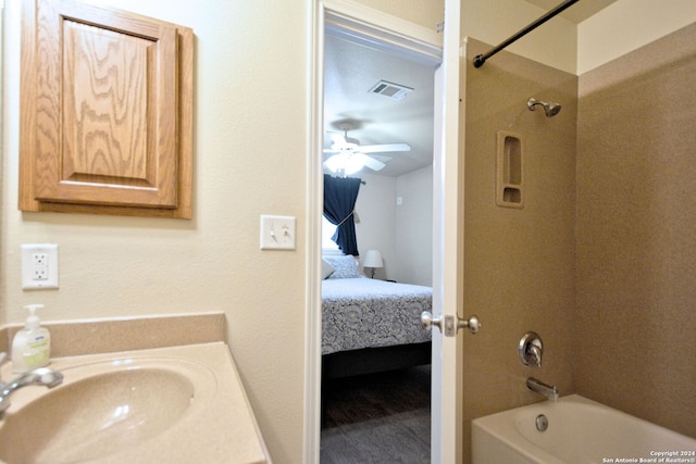 bathroom featuring sink, bathtub / shower combination, and ceiling fan