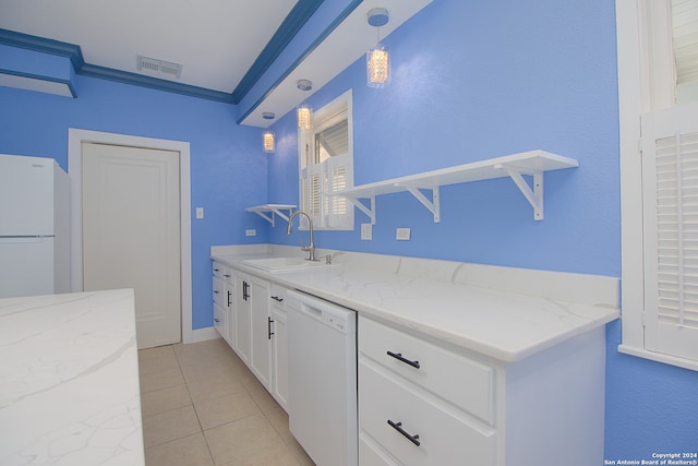 bathroom featuring vanity, tile floors, and crown molding