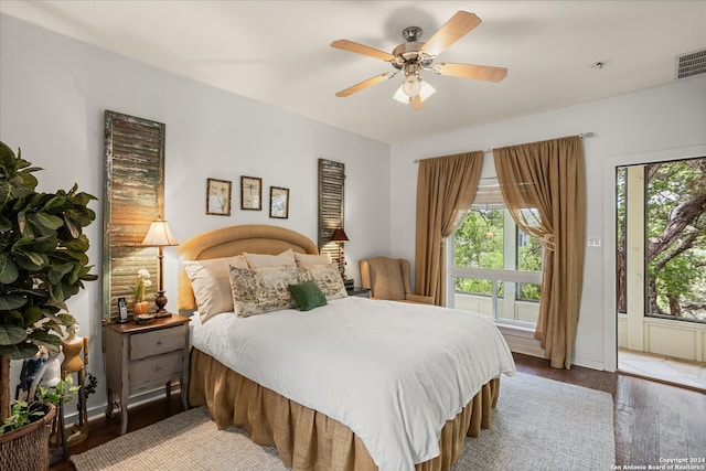 bedroom featuring ceiling fan and hardwood / wood-style floors