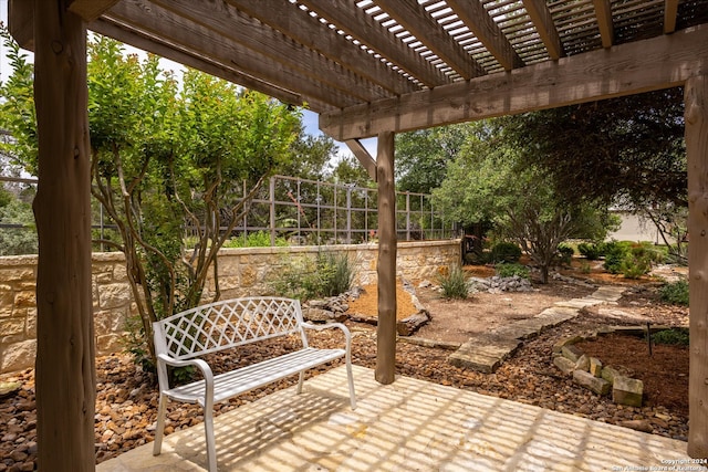 view of patio / terrace featuring a pergola