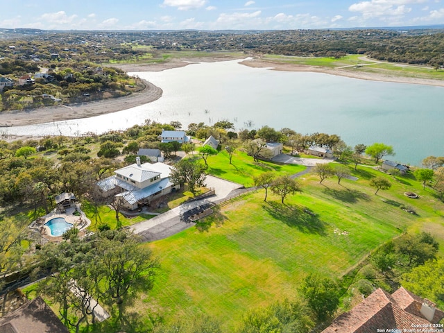 bird's eye view with a water view