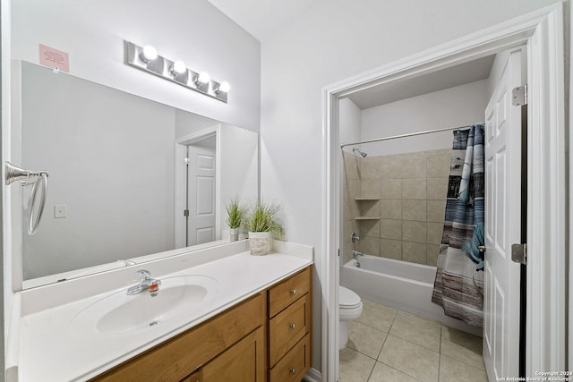 full bathroom with shower / bath combo with shower curtain, tile flooring, vanity, and toilet