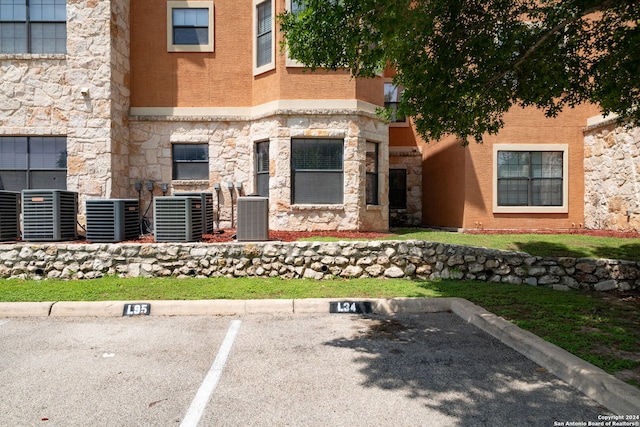 doorway to property featuring central AC