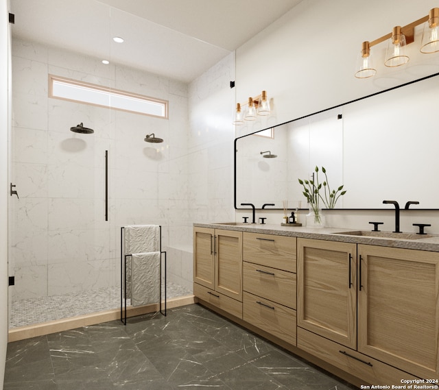 bathroom with vanity, tiled shower, and tile walls