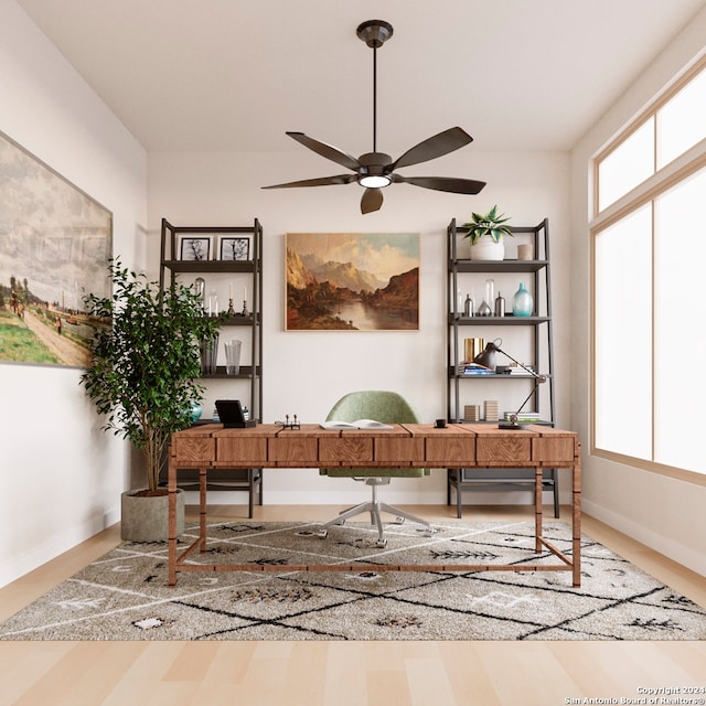 office featuring ceiling fan and wood-type flooring