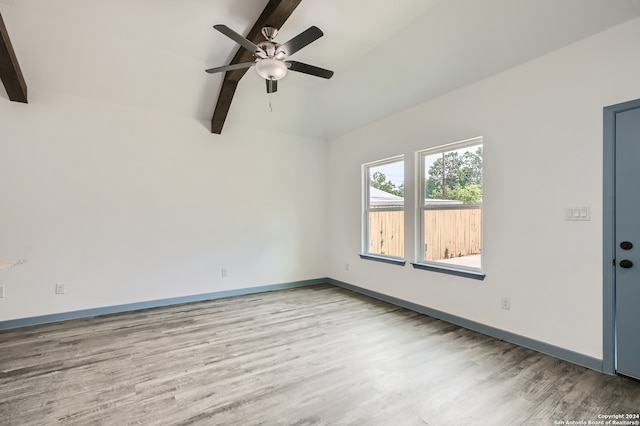 spare room featuring hardwood / wood-style floors and ceiling fan