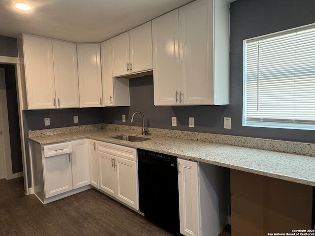 kitchen with dishwasher, sink, dark hardwood / wood-style flooring, and white cabinets