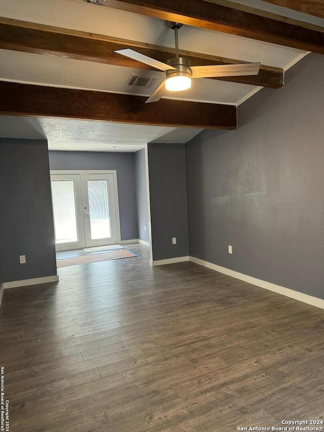 unfurnished room with beamed ceiling, french doors, ceiling fan, and dark hardwood / wood-style flooring