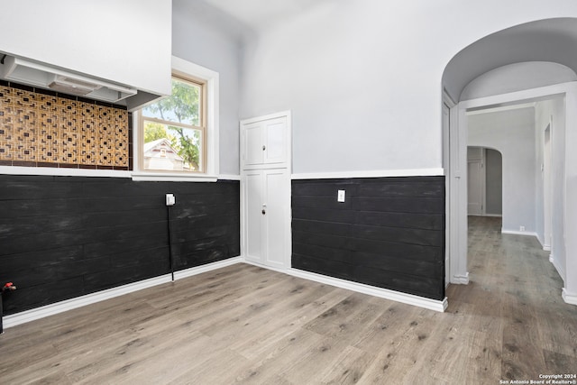 empty room with light wood-type flooring