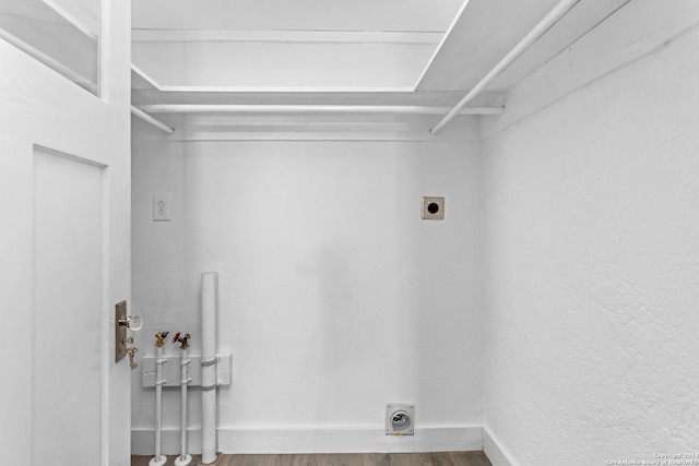 laundry room featuring hookup for an electric dryer, wood-type flooring, and washer hookup