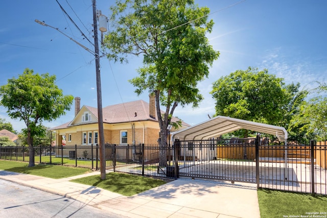 view of front of property featuring a carport