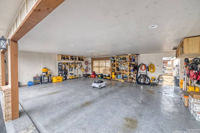 garage with a workshop area