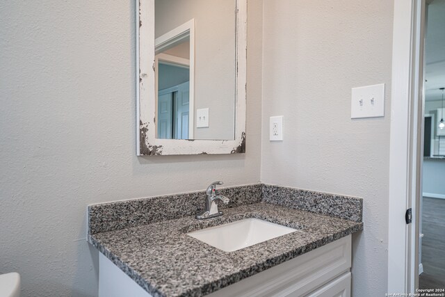 bathroom featuring vanity with extensive cabinet space