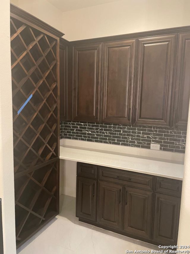 bathroom featuring tasteful backsplash