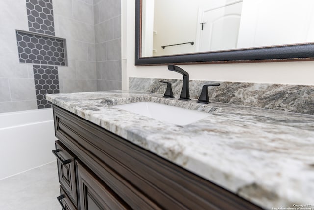 bathroom with vanity and tile patterned floors