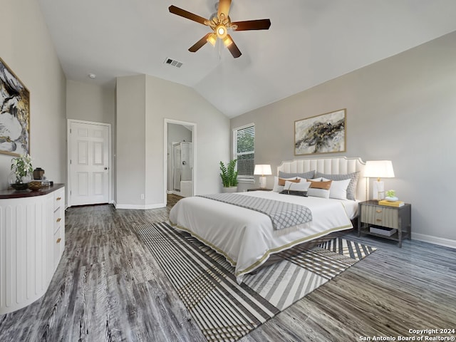 bedroom with high vaulted ceiling, dark wood-type flooring, connected bathroom, and ceiling fan