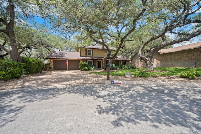 view of front of property with a garage