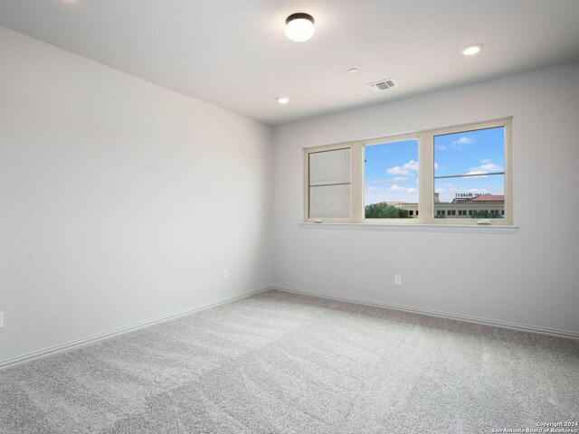 empty room with carpet floors