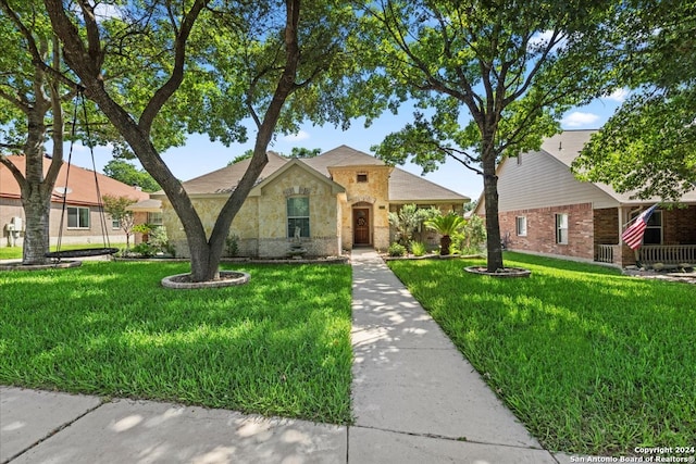 view of front of home with a front yard