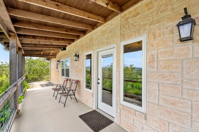 doorway to property featuring a patio