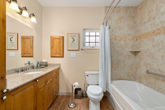 full bathroom with shower / tub combo, toilet, and large vanity