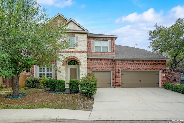 view of front of property with a garage