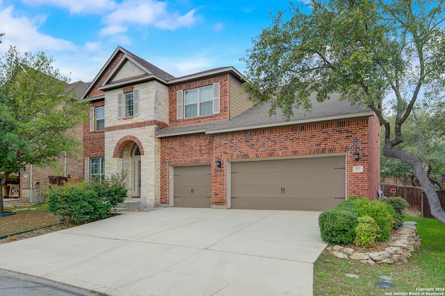 view of front of property with a garage