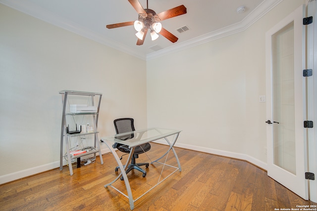 home office with wood-type flooring, ornamental molding, and ceiling fan