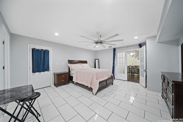 bedroom featuring light tile flooring and ceiling fan