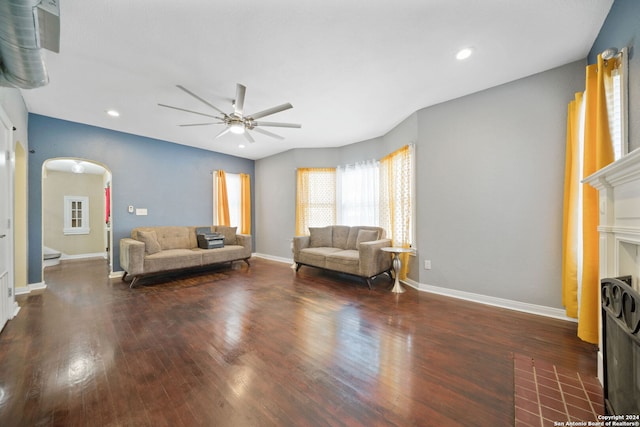 living room with ceiling fan and hardwood / wood-style floors