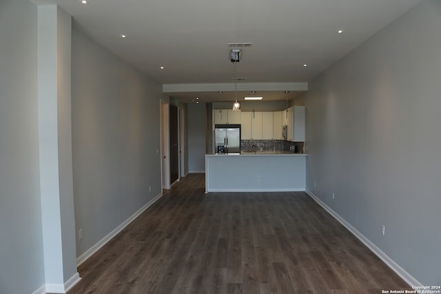 unfurnished living room featuring dark hardwood / wood-style flooring