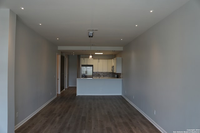 unfurnished living room with dark hardwood / wood-style flooring