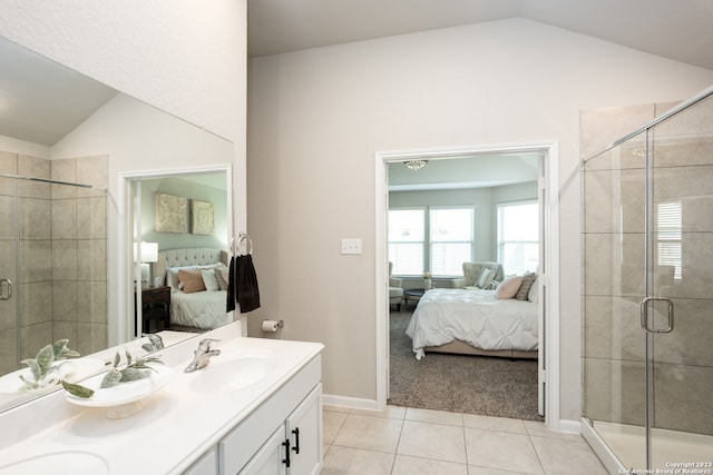 bathroom featuring an enclosed shower, tile flooring, and vaulted ceiling